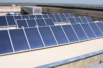 Image showing solar panels on roof boards 