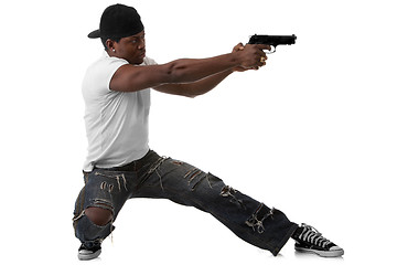 Image showing Young thug with a gun