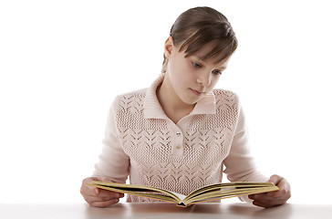 Image showing Portrait of a girl reading