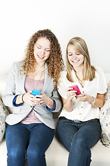 Image showing Two women using mobile devices