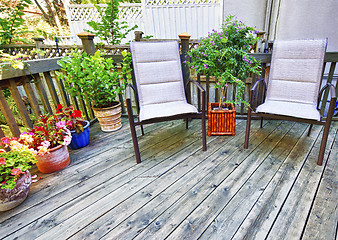 Image showing Chairs on wooden deck