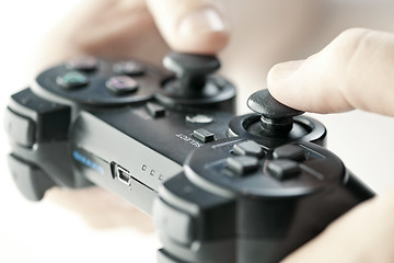 Image showing Hands with game controller