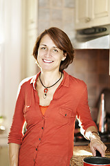 Image showing Happy woman in kitchen at home