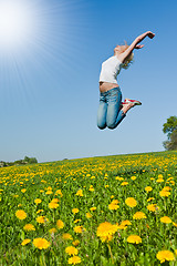 Image showing happy young woman on meadow