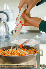 Image showing chef making salad