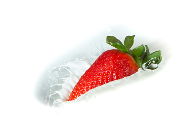 Image showing strawberry splashing into milk