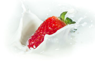 Image showing strawberry splashing into milk