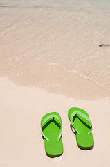 Image showing Flip flops on the beach