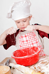 Image showing boy with flour
