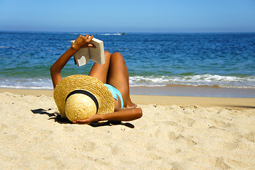 Image showing Woman reading a book 