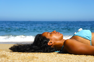 Image showing Woman Sun Tanning