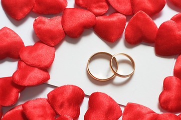 Image showing Wedding rings in hearts environment