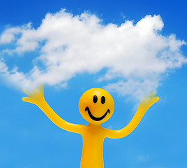 Image showing A happy face holding a cloud