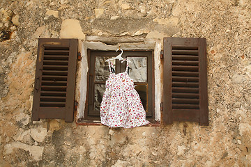 Image showing Dress in window