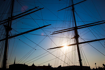 Image showing Ship sails silhouette at sunset