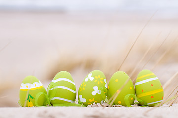 Image showing Easter decorated eggs on sand