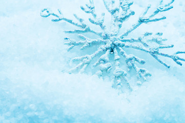 Image showing Snowflake in snow. Christmas