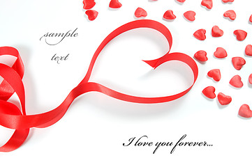 Image showing Love background. Small hearts and ribbon