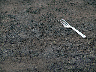 Image showing Plastic fork on ground