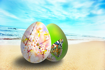 Image showing Colorful easter eggs on sunny beach