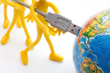 Image showing USB plugs into earth. Conceptual