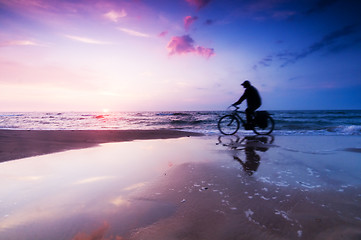 Image showing Healthy lifestyle, beach at sunset