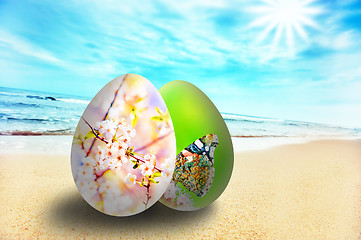 Image showing Colorful easter eggs on sunny beach