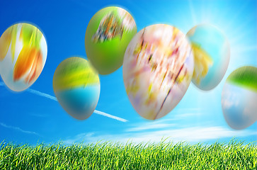 Image showing Falling easter eggs abstact background