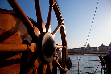 Image showing Ship helm and a view on Stockholm, Sweden