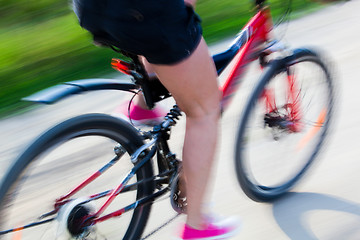 Image showing Active woman on a bike