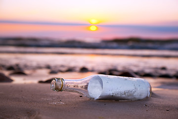Image showing Message in the bottle at sunset