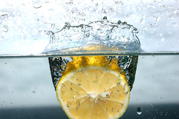 Image showing Lemon splash into water