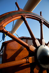 Image showing Old helm, wooden wheel for navigation