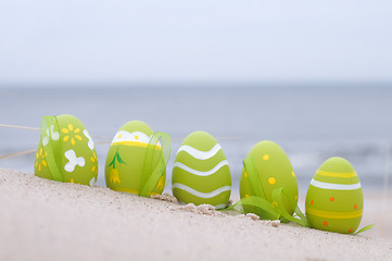 Image showing Easter decorated eggs on sand