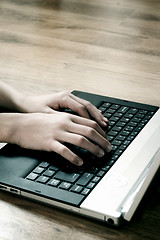 Image showing Typing on laptop