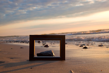 Image showing Frame on the beach at sunset