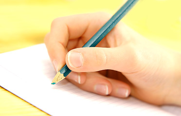 Image showing Child hand writing