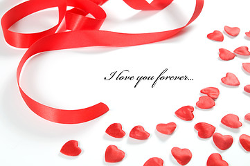 Image showing Love background. Small hearts and ribbon