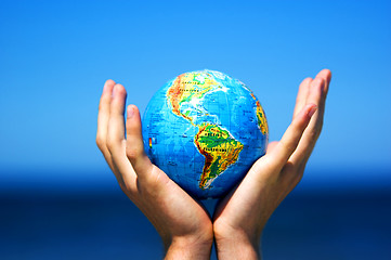 Image showing Earth globe in hands. Conceptual image