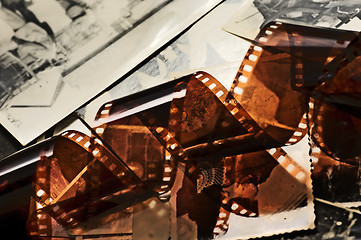 Image showing Old film strip and photos background