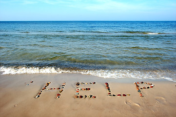 Image showing Word HELP on beach sand