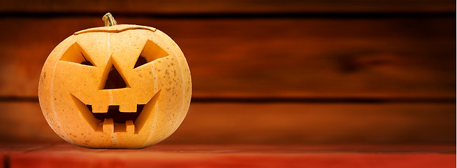 Image showing Halloween pumpkin. Wooden background