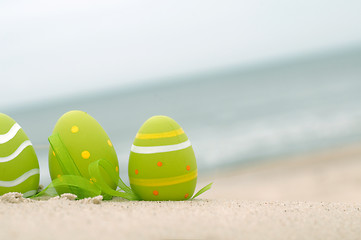 Image showing Easter decorated eggs on sand