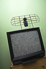 Image showing Old TV set, noisy picture, aerial.
