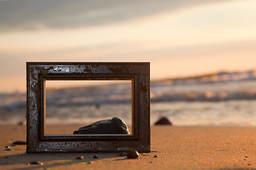 Image showing Frame on the beach at sunset