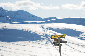 Image showing The signpost in the winter mountains