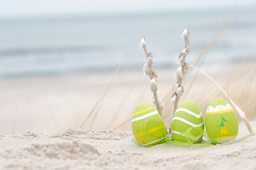 Image showing Easter decorated eggs on sand