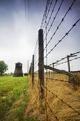 Image showing Barbed wire fence to prison