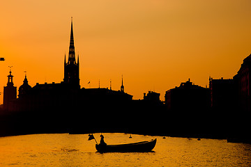 Image showing Romantic Stockholm, Sweden. Boat at sunset