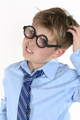 Image showing School student in comical spectacles and a confusedl expression